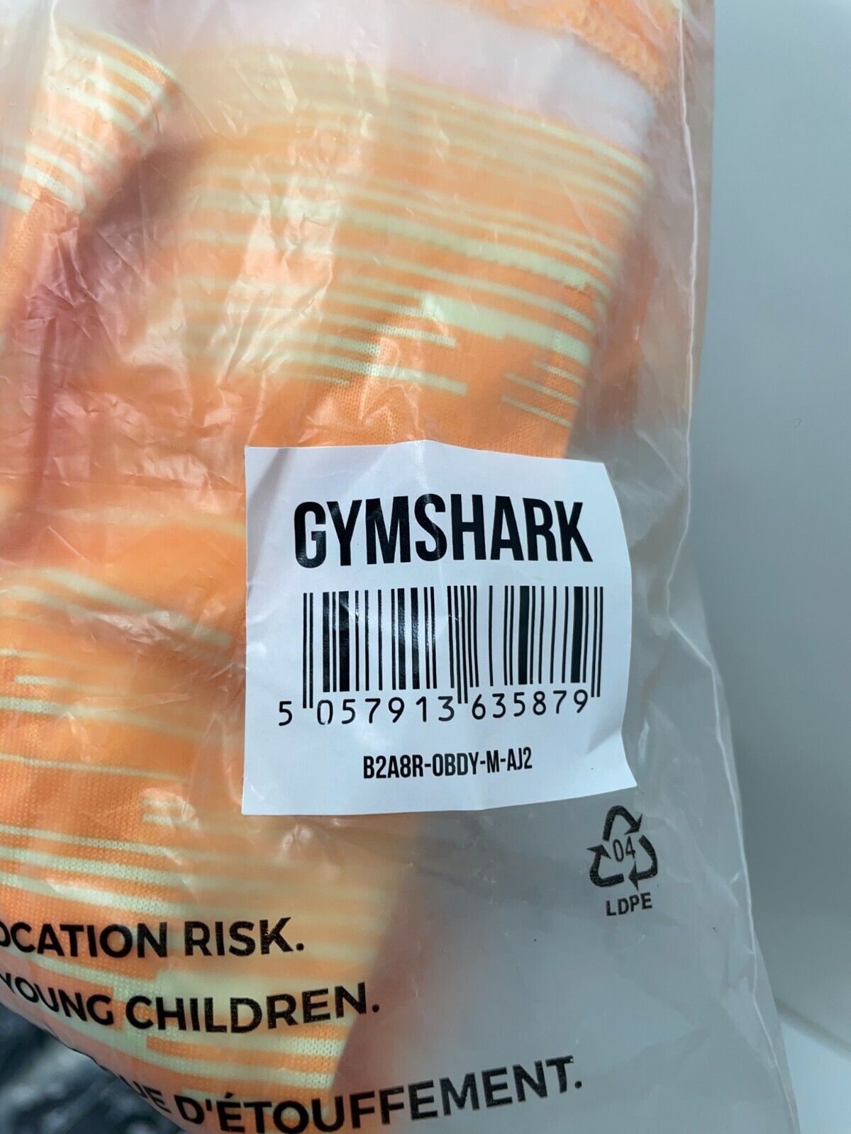 Gymshark Women M Sport Loose Long Sleeve T-Shirt Orange Print Cropped B2A8R-OBDY