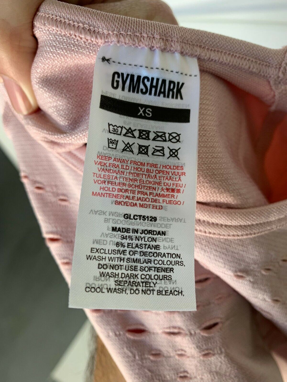 Gymshark Womens XS Glow Long Sleeve Seamless Crop Top Light Pink Perforated