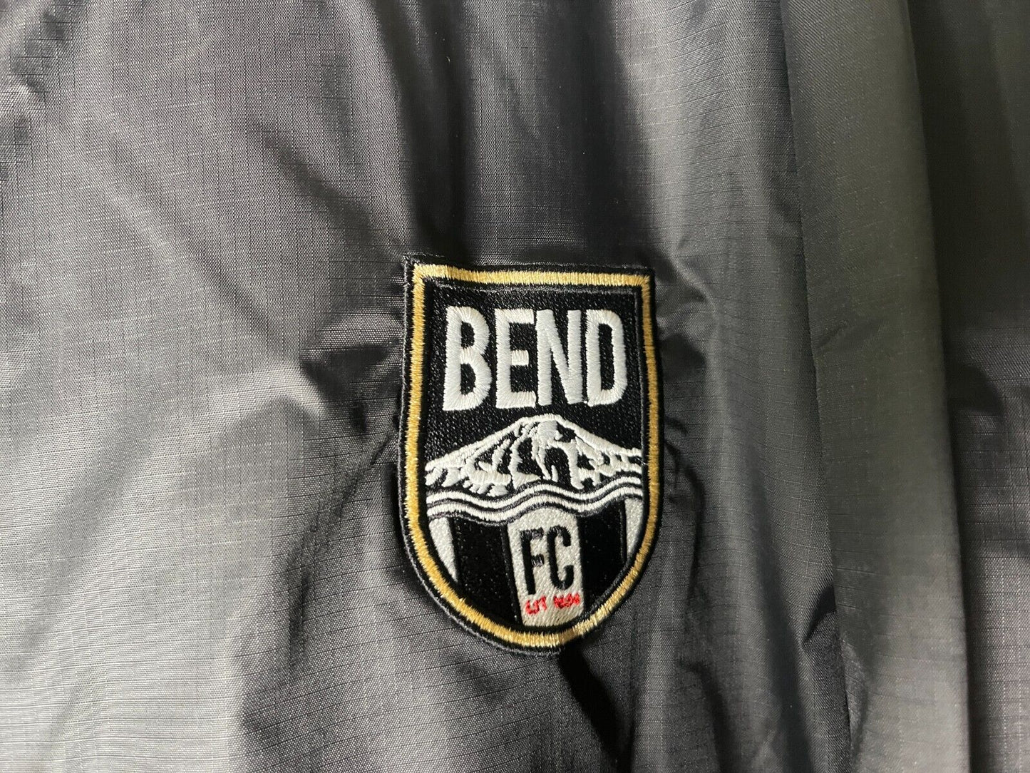 Capelli Sport Bend FC Men's L Neultral Basics Storm Jacket Black Hooded AGA-5229