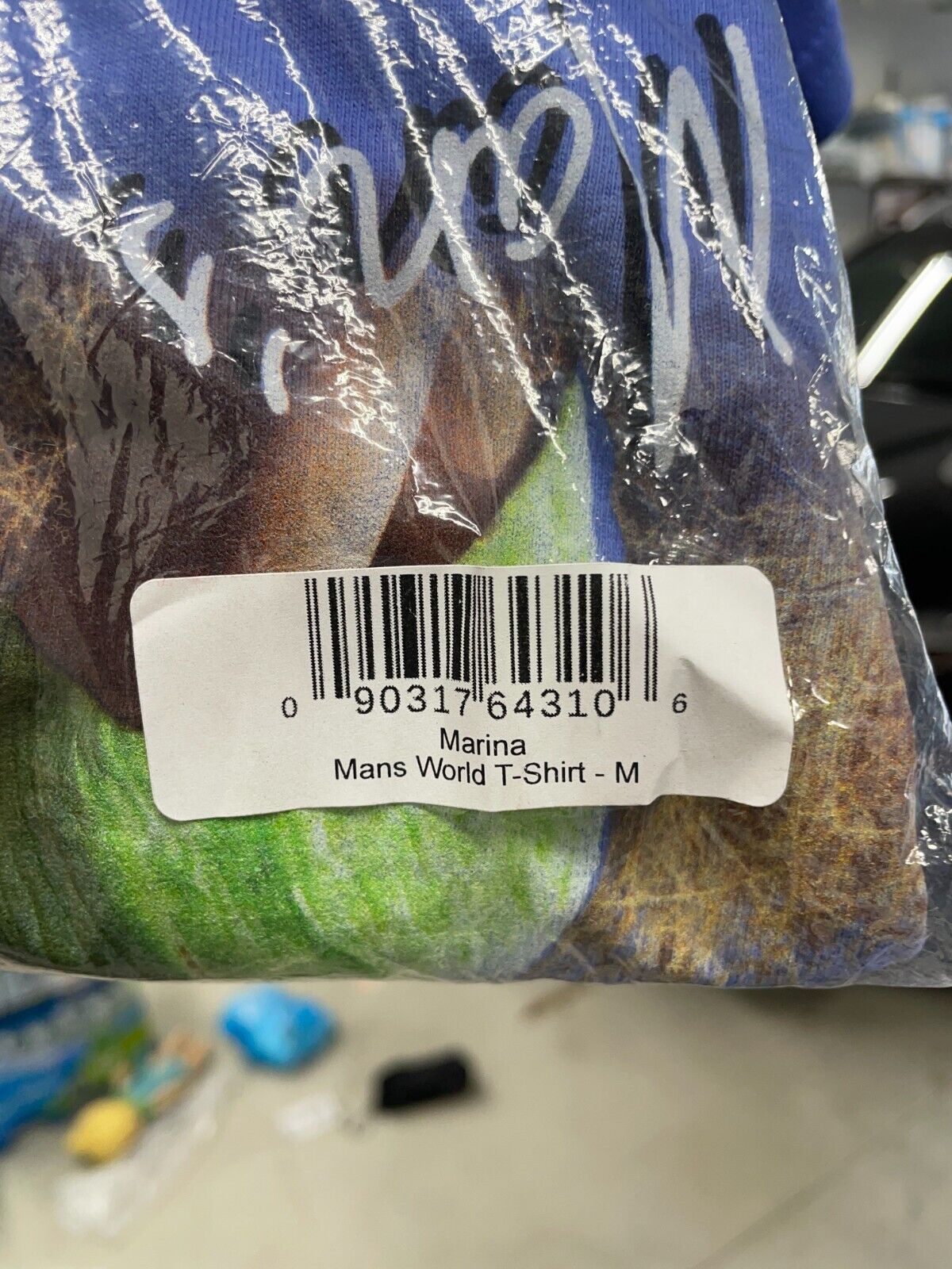 Marina Unisex M Mans World T-Shirt Blue Graphic Tee Short Sleeve Crewneck Pop