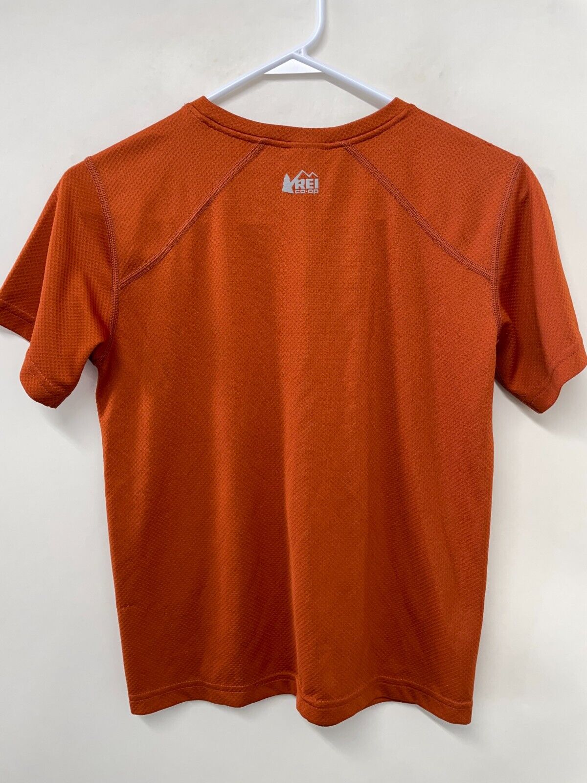 REI CoOp Kids L 14-16 A Wilderness Spirit Born in 1938 Shirt Orange Short Sleeve